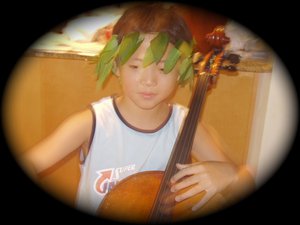 "Practicing during the summer at home with vines from our backyard. Summer 2005."